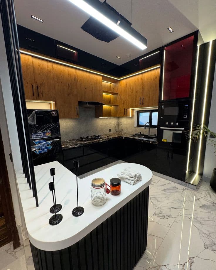 Modern luxury kitchen with wood grain upper cabinets New Town Kolkata