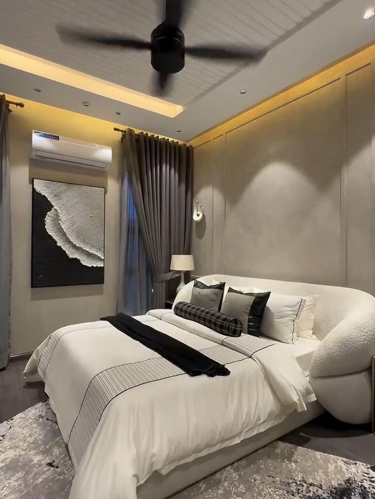 Serene master suite sanctuary with curved bouclé headboard and wall panelling