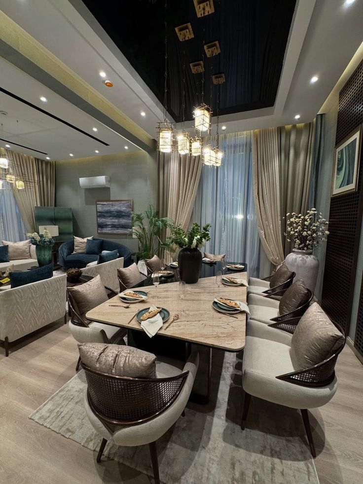 Curated formal dining salon with custom chandelier and marble flooring