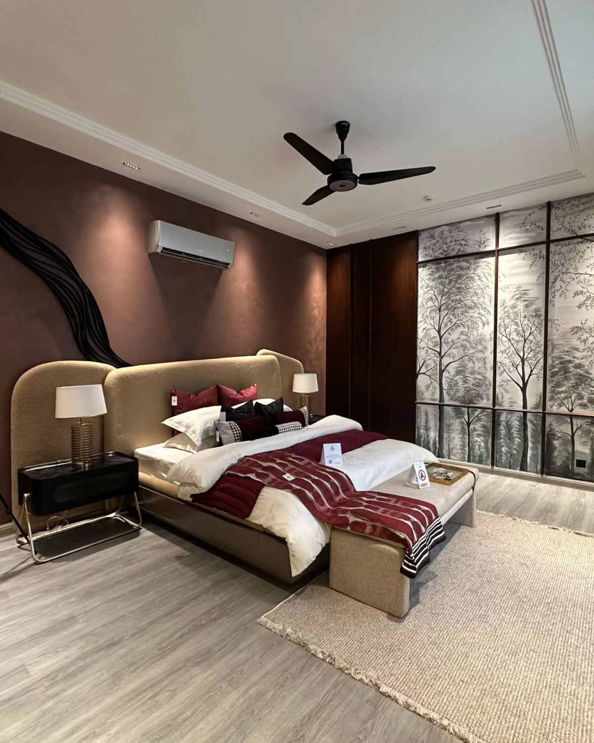 Architectural master bedroom with integrated warm timber joinery